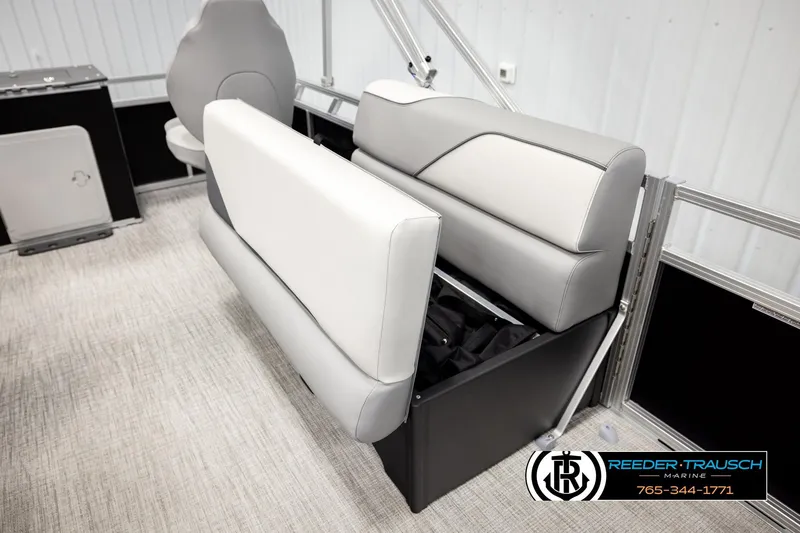 Slide: The Image of 2026 Avalon VEN RF boat interior with gray seating and storage compartment. - 21
