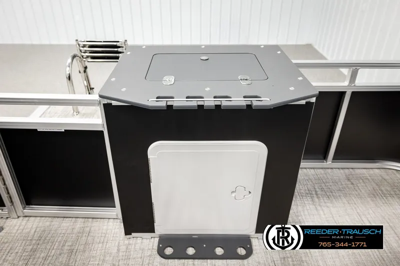 Slide: The Image of 2026 Avalon VEN RF boat storage compartment with sleek design and secure latch. - 22