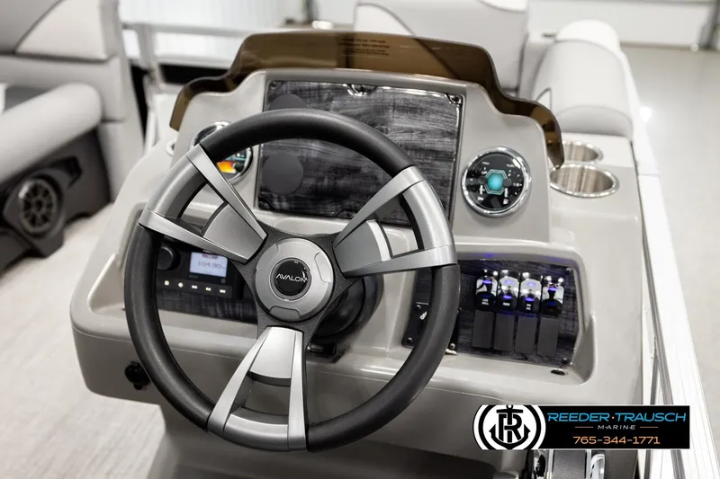 Slide: The Image of Steering console of 2026 Avalon VEN RF boat with modern controls and sleek design. - 26