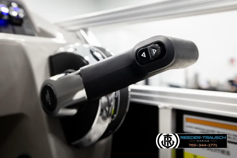 Slide: The Image of Close-up of Avalon VEN RF 2026 boat throttle control with Reeder-Trausch Marine logo. - 33