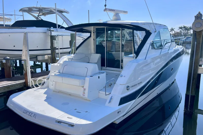 Slide: The Image of 2018 Cruisers Yachts 41 Cantius docked in Cortez, Florida, featuring sleek design and modern amenities. - 10