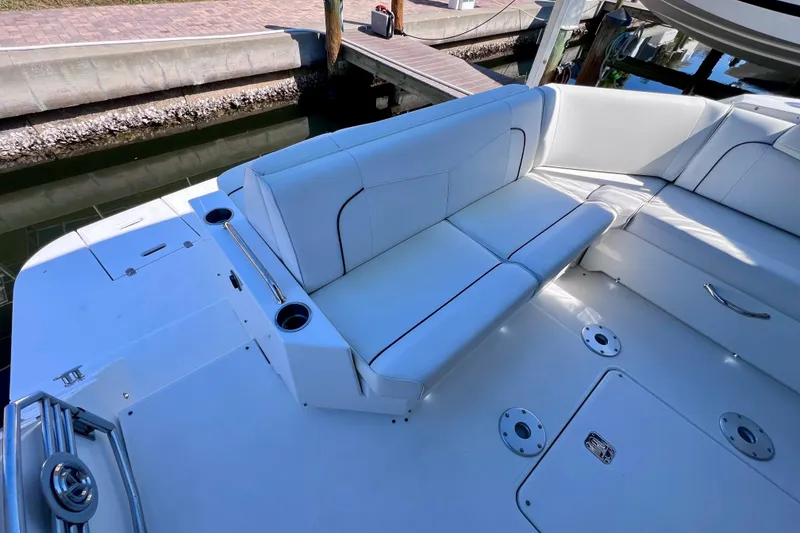Slide: The Image of 2018 Cruisers Yachts 41 Cantius with white seating and cup holders on deck. - 15