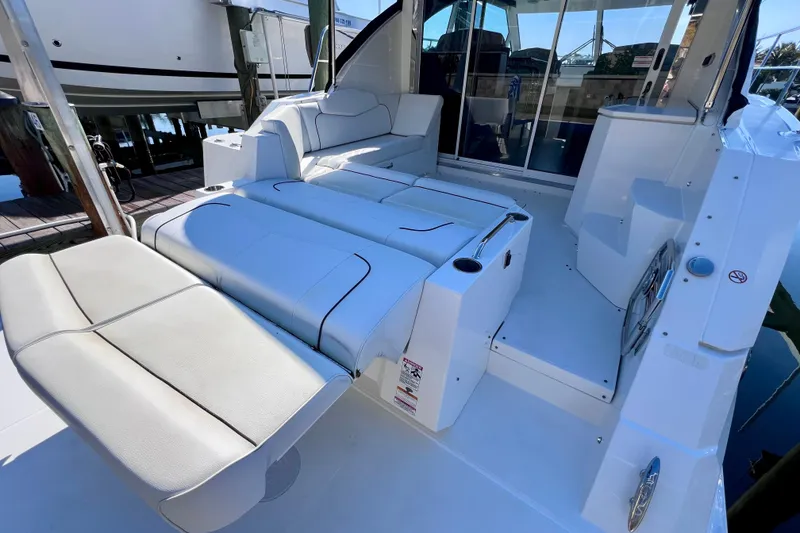 Slide: The Image of 2018 Cruisers Yachts 41 Cantius interior with white seating and modern design. - 18