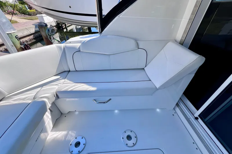 Slide: The Image of 2018 Cruisers Yachts 41 Cantius storage compartment with open seat and marine accessories. - 20