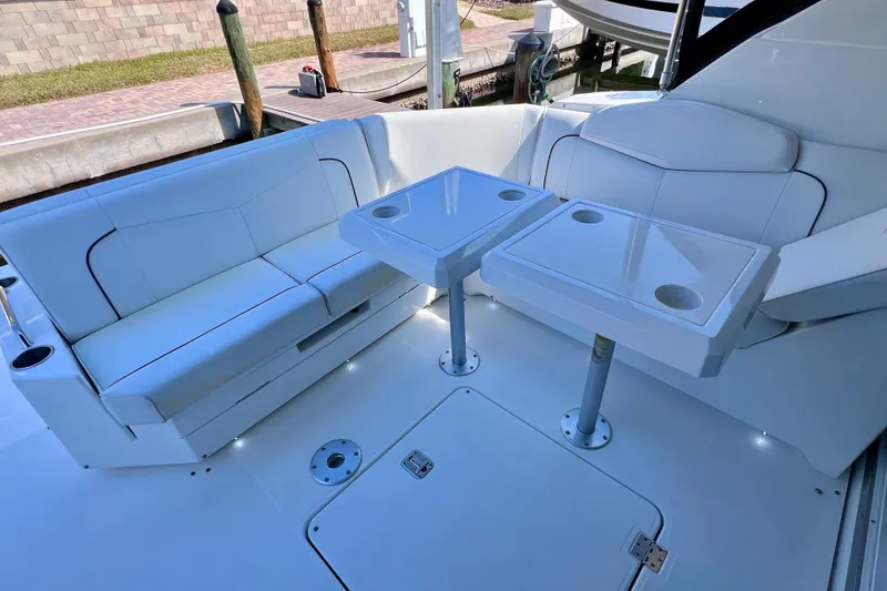 Slide: The Image of 2018 Cruisers Yachts 41 Cantius interior with white seating and sleek design. - 21