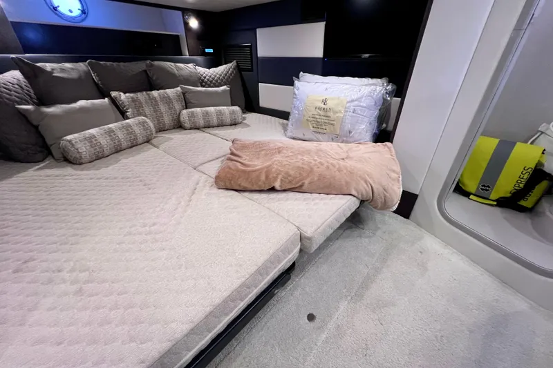 Slide: The Image of Luxurious interior of 2018 Cruisers Yachts 41 Cantius with plush bedding and modern design. - 53