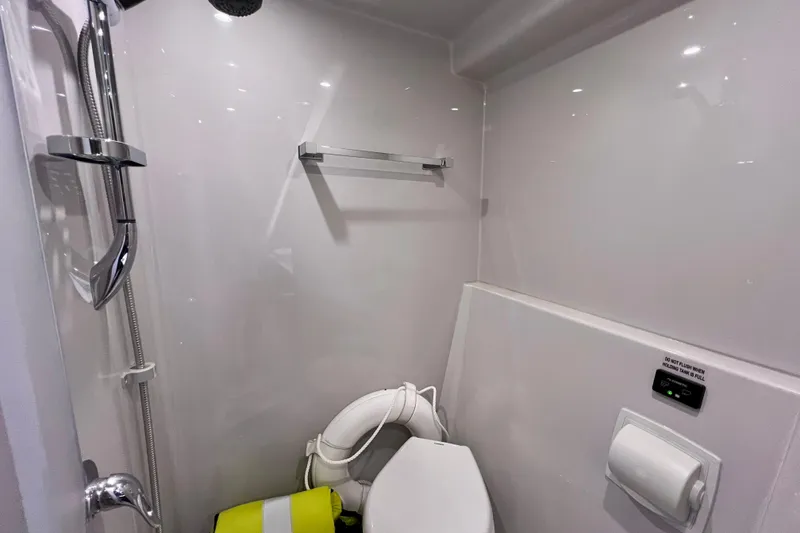 Slide: The Image of Bathroom interior of 2018 Cruisers Yachts 41 Cantius with shower and toilet. - 56