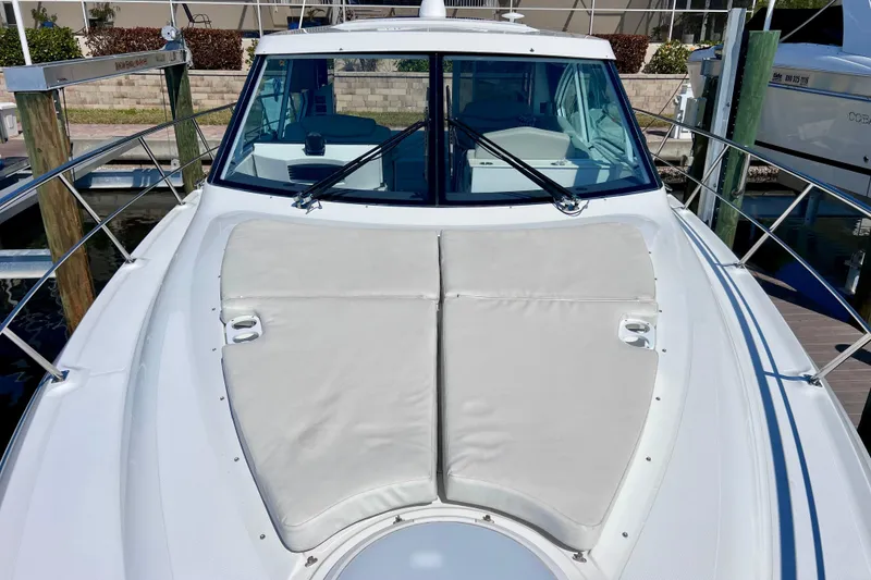 Slide: The Image of 2018 Cruisers Yachts 41 Cantius boat with cushioned deck, docked at marina. - 80