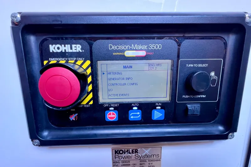 Slide: The Image of Kohler Decision-Maker 3500 control panel on 2018 Cruisers Yachts 41 Cantius. - 90