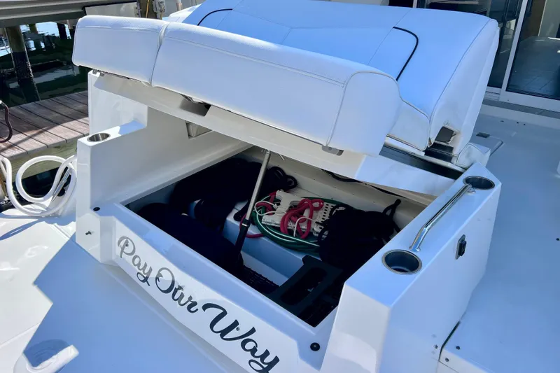 Slide: The Image of White seating area on 2018 Cruisers Yachts 41 Cantius boat interior. - 23