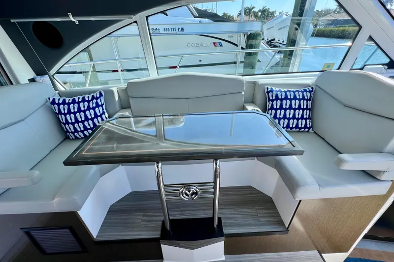 Slide: The Image of Luxurious interior of 2018 Cruisers Yachts 41 Cantius with elegant seating and table. - 33