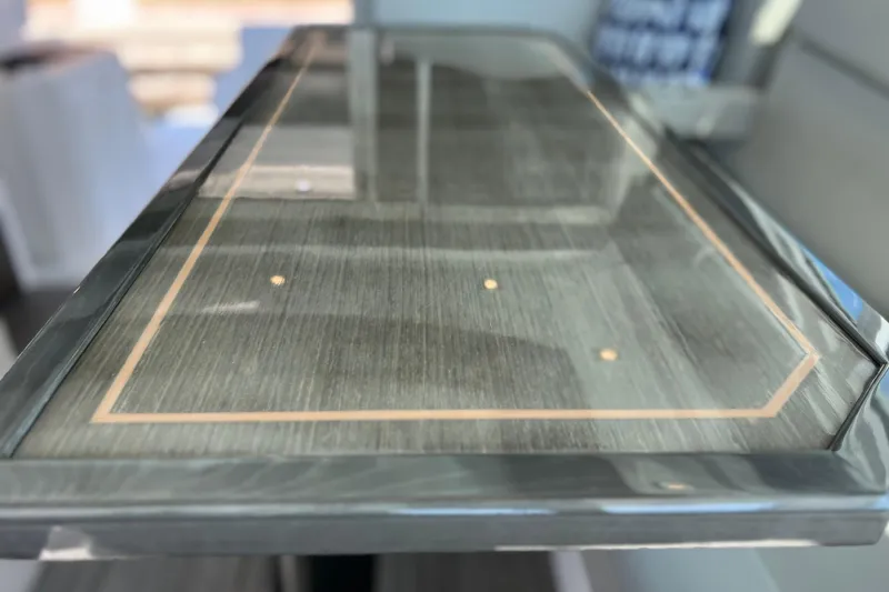 Slide: The Image of Glass table surface on 2018 Cruisers Yachts 41 Cantius, showcasing sleek design. - 47