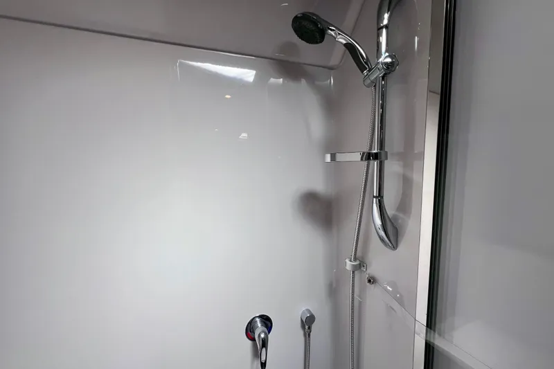 Slide: The Image of Shower area in 2018 Cruisers Yachts 41 Cantius, featuring modern chrome fixtures. - 69
