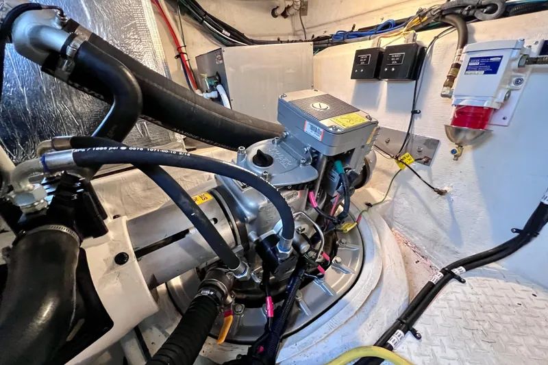 Slide: The Image of Engine room of 2018 Cruisers Yachts 41 Cantius with visible mechanical components. - 86