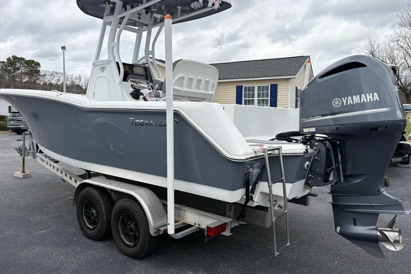 Slide: The Image of 2019 Tidewater 232 CC Adventure boat with Yamaha engine on trailer. - 2