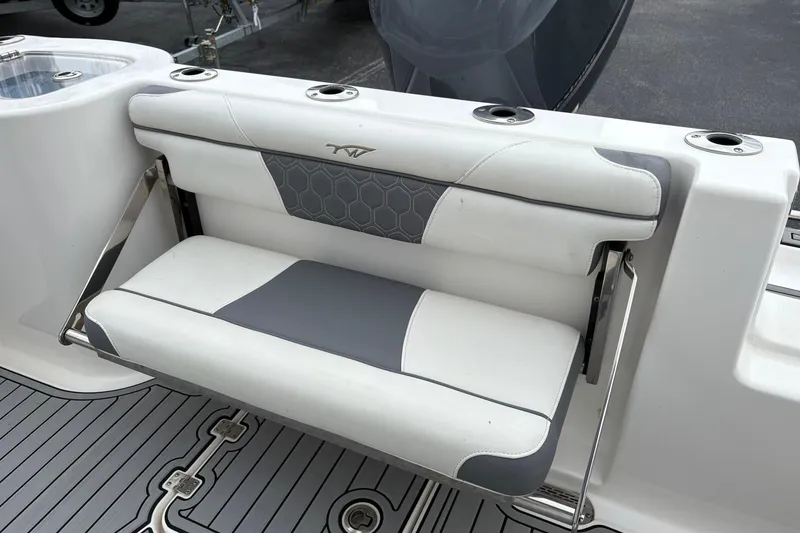Slide: The Image of 2019 Tidewater 232 CC Adventure boat seat with gray and white upholstery. - 25
