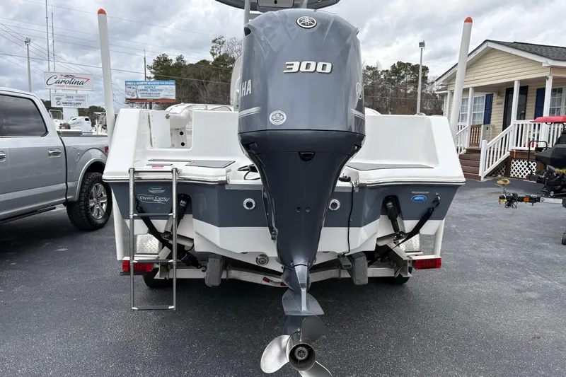 Slide: The Image of 2019 Tidewater 232 CC Adventure boat with Yamaha 300 engine, parked on a trailer. - 4