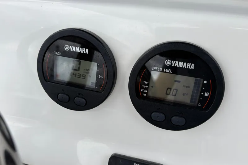 Slide: The Image of Yamaha gauges on 2019 Tidewater 232 CC Adventure boat dashboard. - 8
