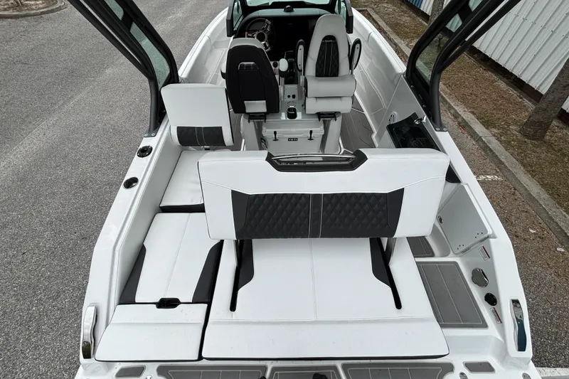 Slide: The Image of 2026 Monterey Elite 25 OB boat interior with luxurious seating and modern design. - 15