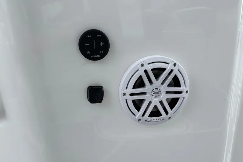 Slide: The Image of Audio controls and speaker on 2026 Monterey Elite 25 OB boat. - 21