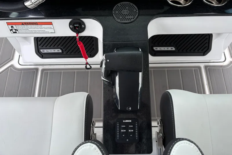 Slide: The Image of 2026 Monterey Elite 25 OB boat cockpit with modern controls and sleek design. - 24