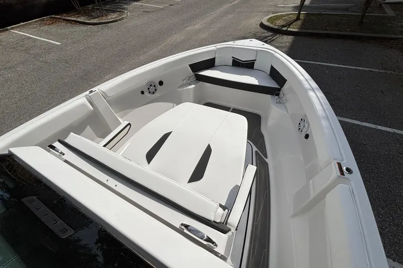 Slide: The Image of 2026 Monterey Elite 25 OB boat interior with sleek seating and modern design. - 31