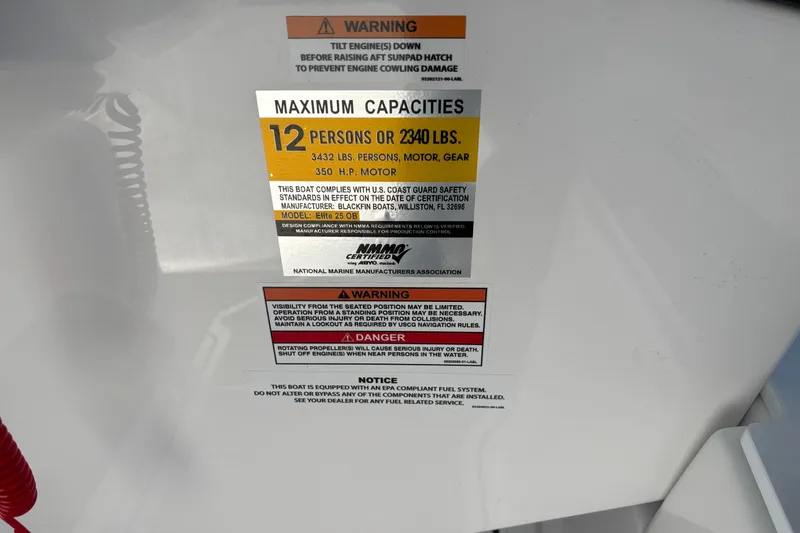 Slide: The Image of 2026 Monterey Elite 25 OB capacity label: 12 persons, 2340 lbs, 350 HP motor. - 38