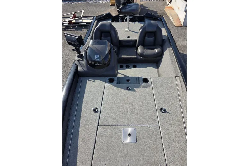Slide: The Image of 2019 Tracker Pro Team 175 TXW boat interior with seating and control panel. - 14