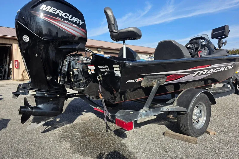 Slide: The Image of 2019 Tracker Pro Team 175 TXW boat with Mercury outboard motor on trailer. - 3