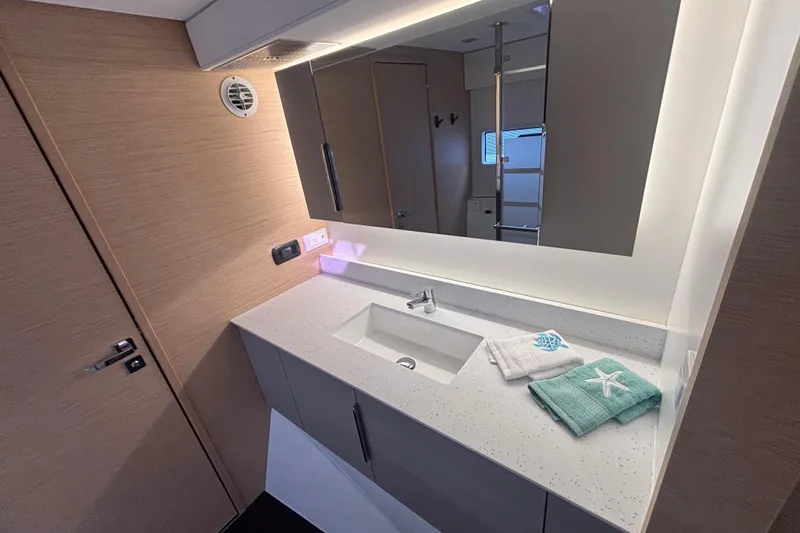 Slide: The Image of Modern bathroom interior on 2025 Fountaine Pajot 41 yacht, featuring sleek design and elegant fixtures. - 25