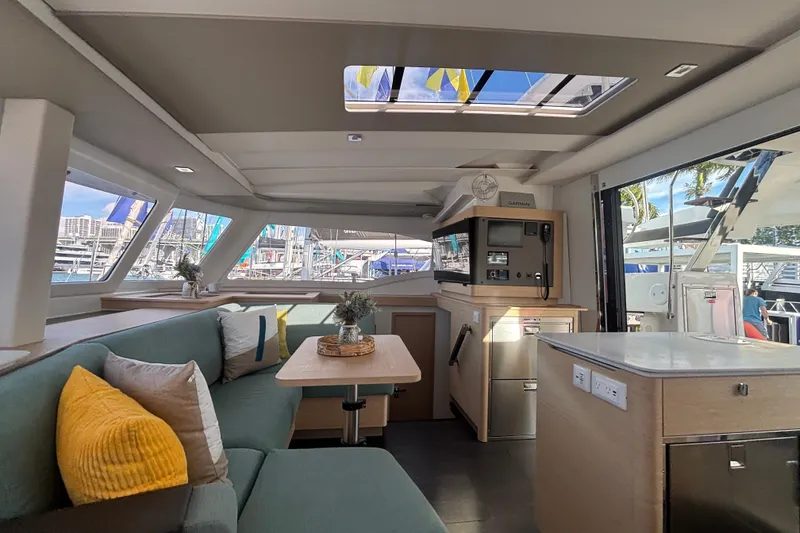 Slide: The Image of Luxurious interior of 2025 Fountaine Pajot 41 catamaran with modern furnishings and large windows. - 30
