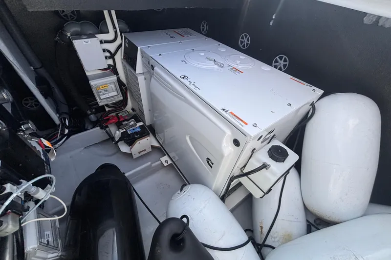 Slide: The Image of Engine compartment of 2025 Fountaine Pajot 41 catamaran with equipment and components. - 45