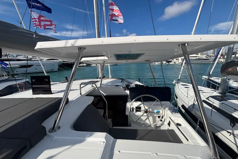 Slide: The Image of Luxurious interior of 2025 Fountaine Pajot 41 catamaran with modern kitchen and seating area. - 15