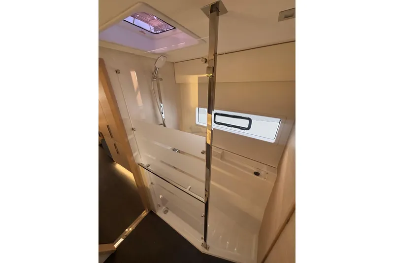 Slide: The Image of Luxurious 2025 Fountaine Pajot 41 catamaran interior with modern seating and dining area. - 18