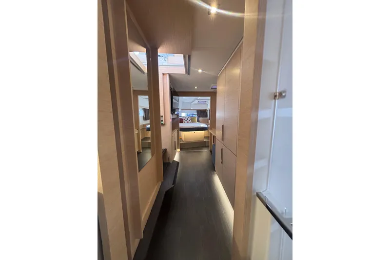 Slide: The Image of Luxurious interior of 2025 Fountaine Pajot 41 catamaran with elegant seating and dining area. - 21
