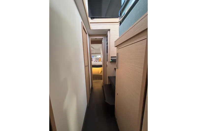 Slide: The Image of 2025 Fountaine Pajot 41 yacht cabin with cozy bed and skylight. - 31