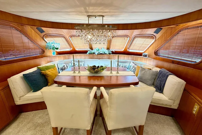 Slide: The Image of Luxurious dining area inside a 1989 Moonen 85 Long Range Cruiser yacht. - 26