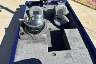Slide: The Image of 2020 Tracker Pro 170 boat interior with two seats and steering console. - 3