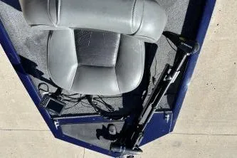 Slide: The Image of 2020 Tracker Pro 170 boat interior with seat and fishing equipment. - 4