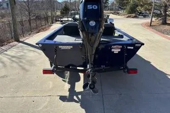 Slide: The Image of 2020 Tracker Pro 170 boat with 50 HP motor, parked on concrete. - 6