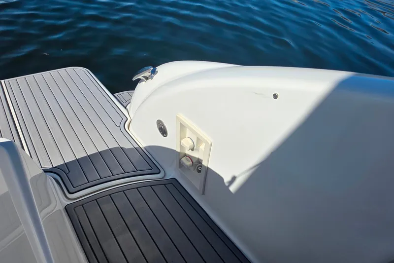Slide: The Image of 2002 Formula 370 Super Sport boat deck with water backdrop. - 14