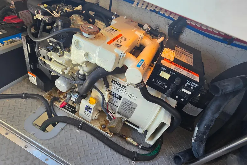 Slide: The Image of Engine compartment of a 2002 Formula 370 Super Sport with Kohler power system. - 28