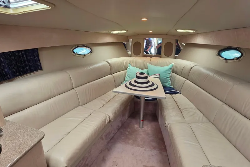 Slide: The Image of Luxurious interior of a 2002 Formula 370 Super Sport yacht with plush seating and decor. - 34