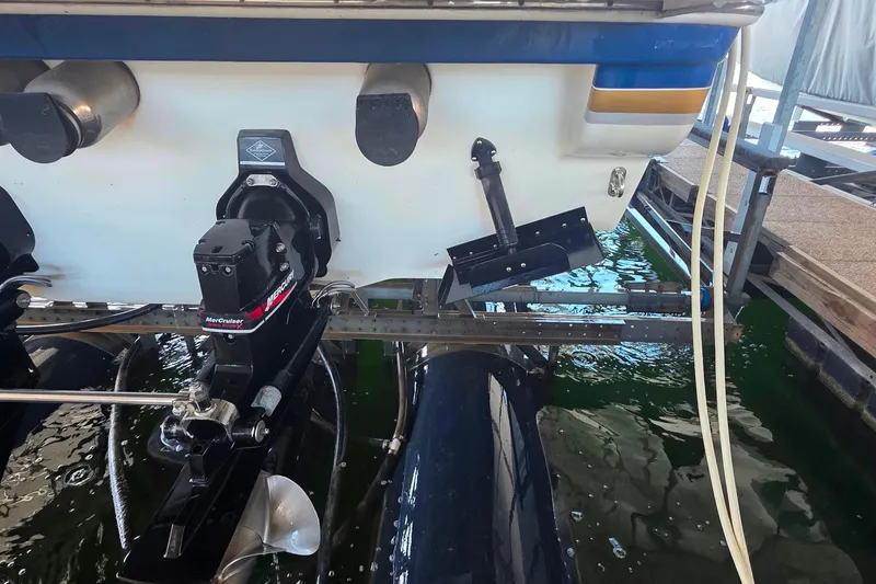 Slide: The Image of Rear view of a 2002 Formula 370 Super Sport boat with MerCruiser outdrive. - 48