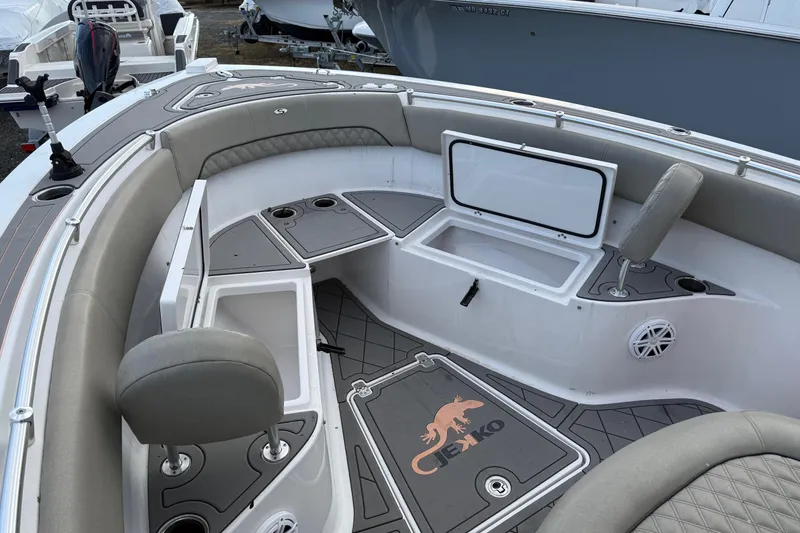 Slide: The Image of 2021 Sportsman Heritage 251 Center Console boat interior with seating and storage compartments. - 19