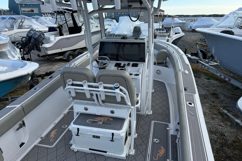 Slide: The Image of 2021 Sportsman Heritage 251 Center Console boat with modern helm and seating. - 7