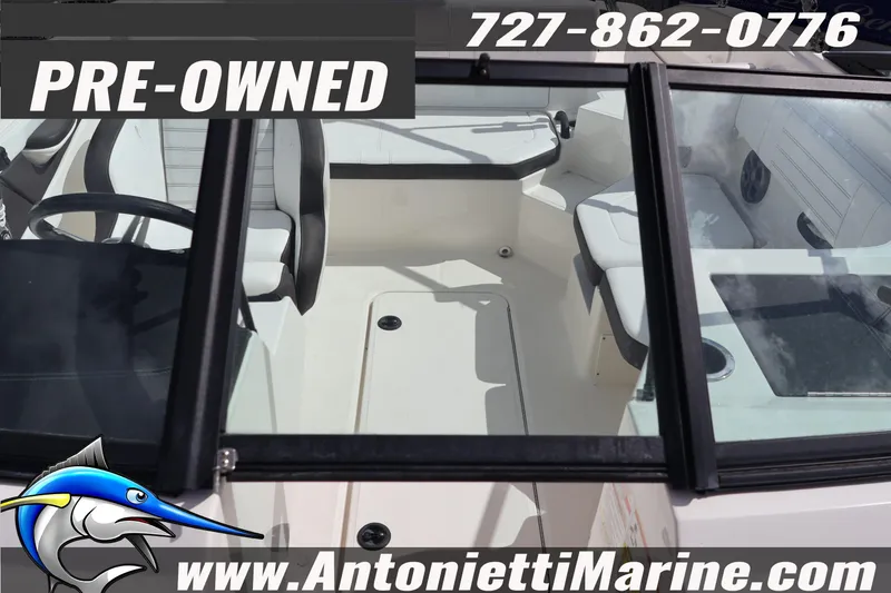 Slide: The Image of Pre-owned 2019 Sea Ray SPX 190 Outboard boat interior, available at Antonietti Marine. - 20