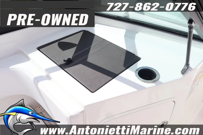 Slide: The Image of Pre-owned 2019 Sea Ray SPX 190 Outboard boat interior with cup holder. - 22