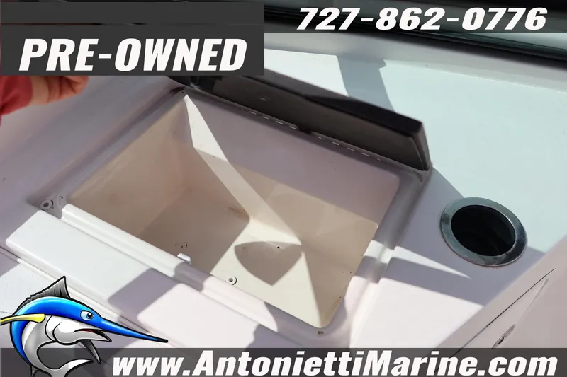 Slide: The Image of Pre-owned 2019 Sea Ray SPX 190 Outboard boat compartment, contact Antonietti Marine. - 23
