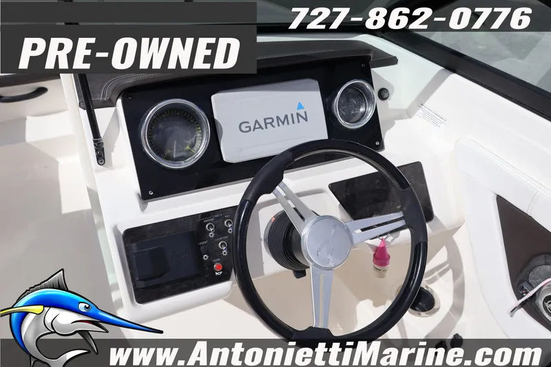 Slide: The Image of Pre-owned 2019 Sea Ray SPX 190 Outboard boat dashboard with Garmin navigation system. - 24